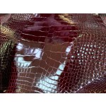 Hermès makes exclusive leather glossy American alligator: Bordeaux red