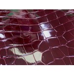 Hermès makes exclusive leather glossy American alligator: Bordeaux red