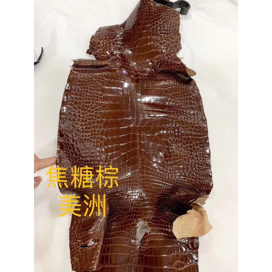 Hermès makes exclusive leather glossy American alligator: caramel brown