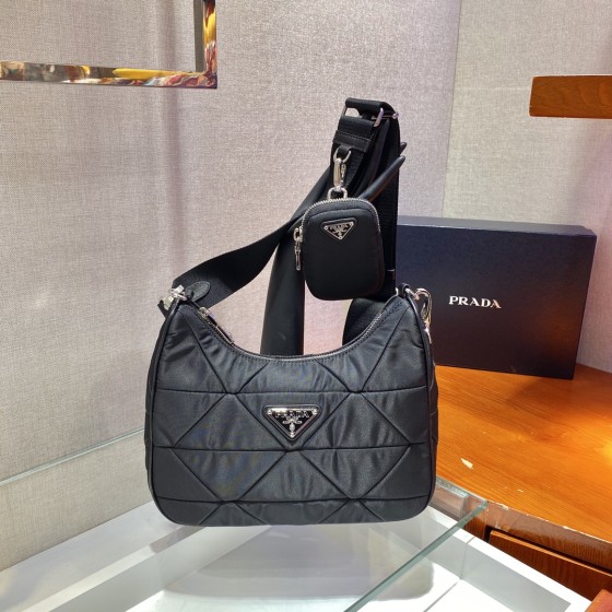 Prada's new three-in-one 🎉1BC151