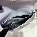 Prada's new mid vintage underarm bag model number: 1BD311