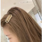 Dior hair clip