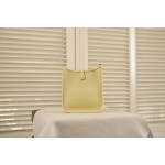 evelyne chick yellow silver buckle TC