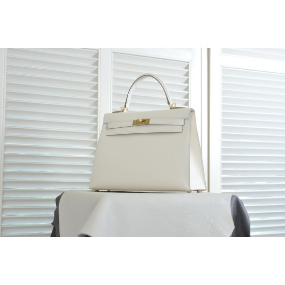 Kelly 25 milkshake white ep leather gold buckle