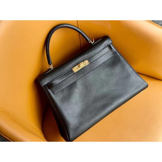 Kelly32 black gold swift leather