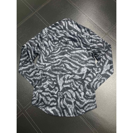 Givenchy full body tiger print paired with the latest quirky pumpkin head bird print