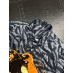 Givenchy full body tiger print paired with the latest quirky pumpkin head bird print