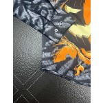 Givenchy full body tiger print paired with the latest quirky pumpkin head bird print