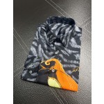 Givenchy full body tiger print paired with the latest quirky pumpkin head bird print