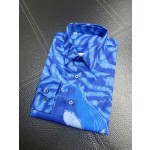 Givenchy full body tiger print paired with the latest quirky pumpkin head bird print