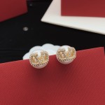 Valentino pearl earrings with V-shaped diamonds