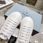 Prada thick sole small white shoes