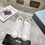 Prada thick sole small white shoes