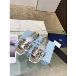 Prada Riveted Metal Heel Sandals