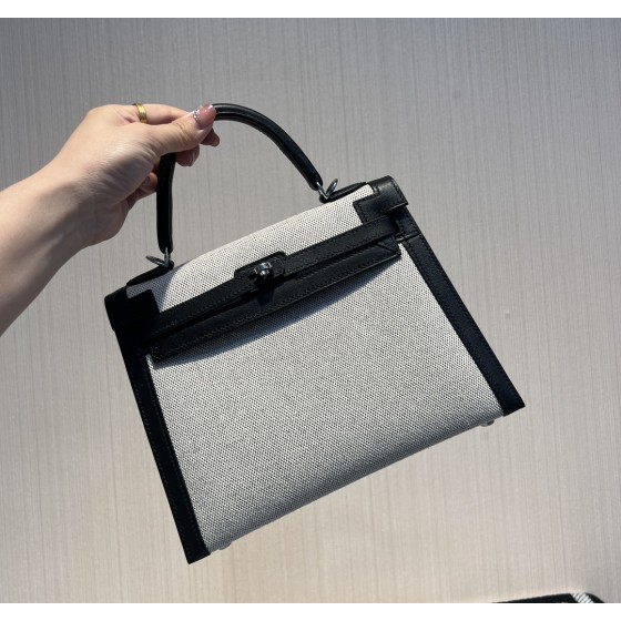 Kelly 25 canvas and swift leather second-hand bag