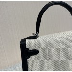 Kelly 25 canvas and swift leather second-hand bag