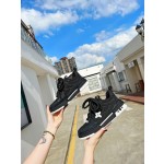 Louis Vuitton with four leaf clover pattern on the side of the shoe