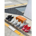 Louis Vuitton with four leaf clover pattern on the side of the shoe