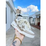 Louis Vuitton with four leaf clover pattern on the side of the shoe