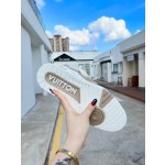 Louis Vuitton with four leaf clover pattern on the side of the shoe