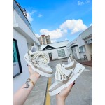 Louis Vuitton with four leaf clover pattern on the side of the shoe