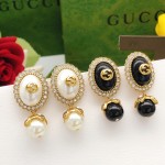 Gucci round black earrings