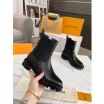 Louis Vuitton vintage cowhide patchwork boots