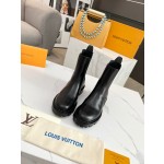 Louis Vuitton vintage cowhide patchwork boots