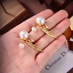 Dior stud earrings