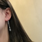 Hermes Pig Nose Asymmetric Tassel Earrings
