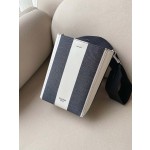 𝐂𝐞𝐥𝐢𝐧𝐞 SANGLE BUCKET Small wide striped fabric bucket bag