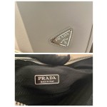 𝐏𝐑𝐀𝐃𝐀 Triangular bag 1NQ043