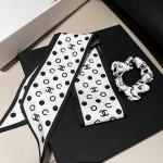 𝐂𝐡𝐚𝐧𝐞𝐥 "Polaroid" 2-in-1 hair tie ➕ribbon 100% silk polka dot black and white