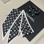 𝐂𝐡𝐚𝐧𝐞𝐥 "Polaroid" 2-in-1 hair tie ➕ribbon 100% silk polka dot black and white