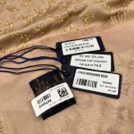𝐋𝐨𝐮𝐢𝐬 𝐯𝐮𝐢𝐭𝐭𝐨𝐧 "MORE MONOGRAM Nailed Shawl" Champagne gold silk wool material
