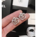 CHANEL🇫🇷Xiaoxiang three-dimensional hollow camellia stud earrings