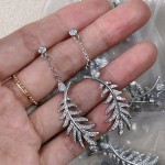 CHANEL🇫🇷Xiaoxiang Hollow Feather Stud Earrings Full Diamond Version Silver Needle