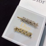 Dior CD brooch
