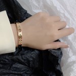 Louis Vuitton LV monogrammed openwork and gemstone bracelet