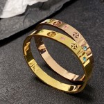 Louis Vuitton LV monogrammed openwork and gemstone bracelet