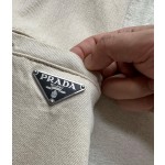 Prada…new denim workwear triangle trousers