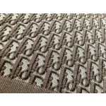 Dior's latest army green knitted jacquard Polo with absolute texture