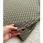 Dior's latest army green knitted jacquard Polo with absolute texture