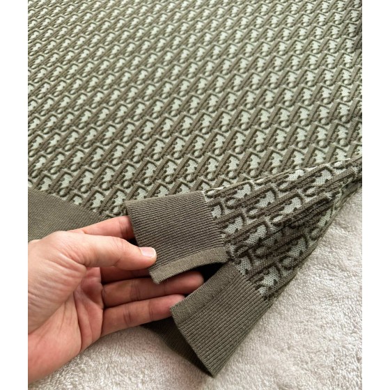 Dior's latest army green knitted jacquard Polo with absolute texture