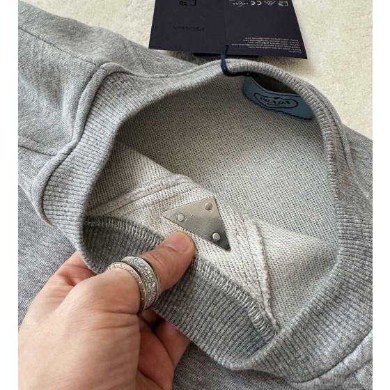 Prada's latest iron plate hardware crew neck sweater
