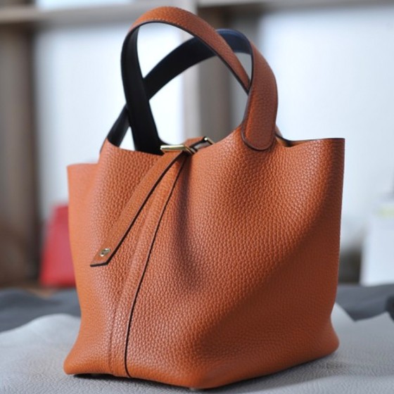 picotin18 classic orange with midnight blue TC leather on the wrist